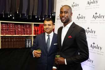 Carlton Cole a English footballer with Master Tailor Arshad