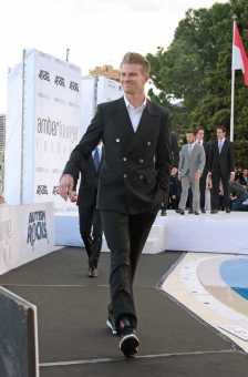 F1 drivers take to the catwalk surrounded by an audience of fashion icons, Hollywood stars, and world press