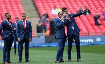 The players all look great in their bespoke Apsley suits