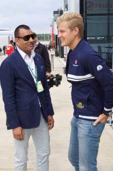 Arshad Mahmood With team members